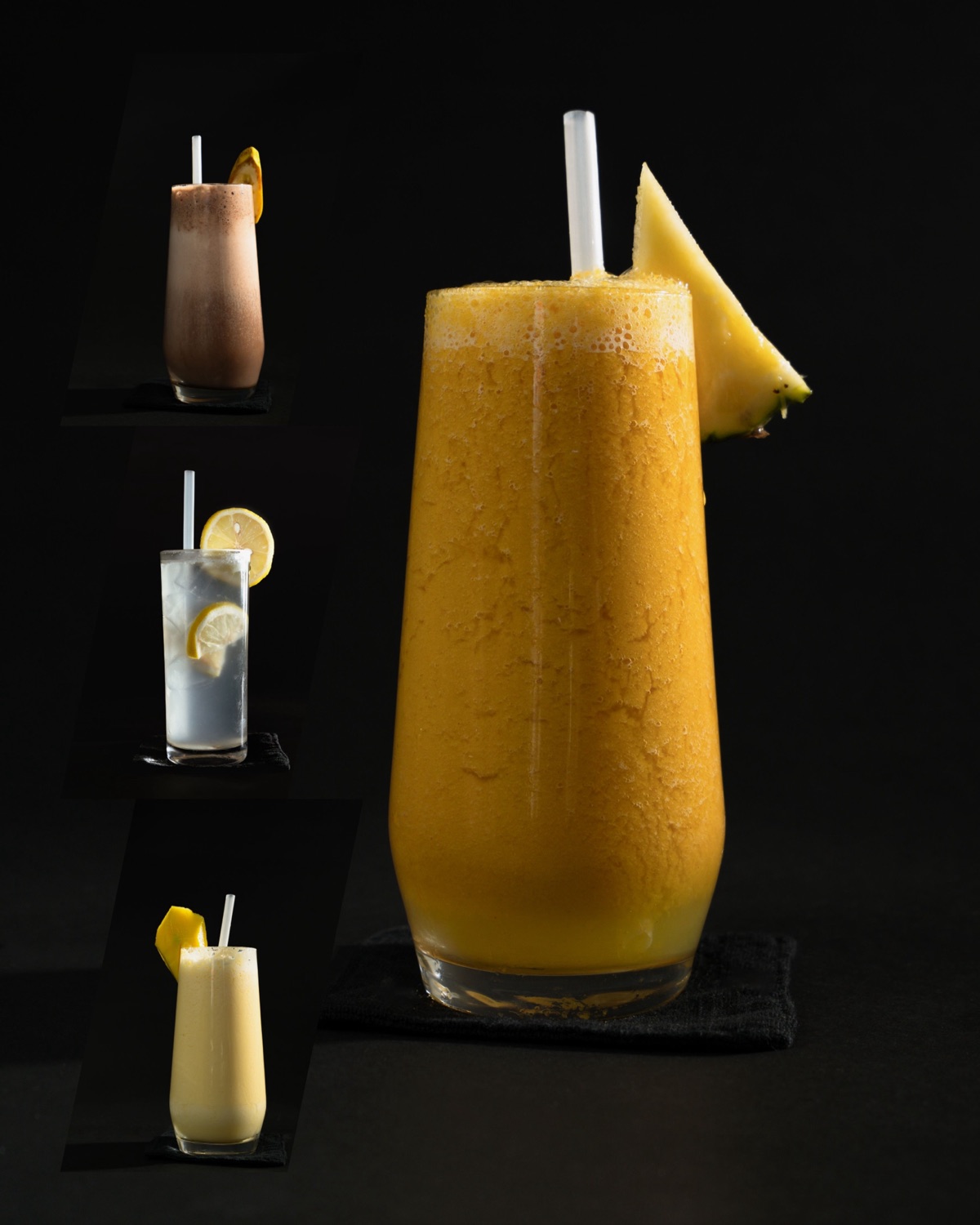 Pineapple smoothie in front of a chocolate shake, lemonade and a banana smoothie